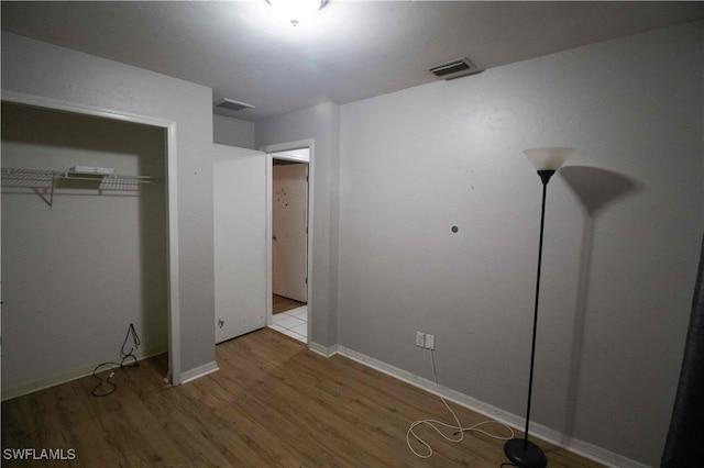 unfurnished bedroom featuring light hardwood / wood-style flooring