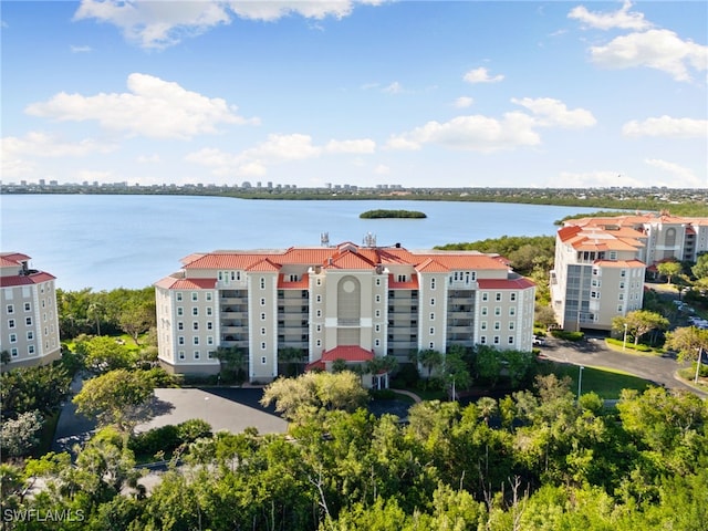 bird's eye view with a water view