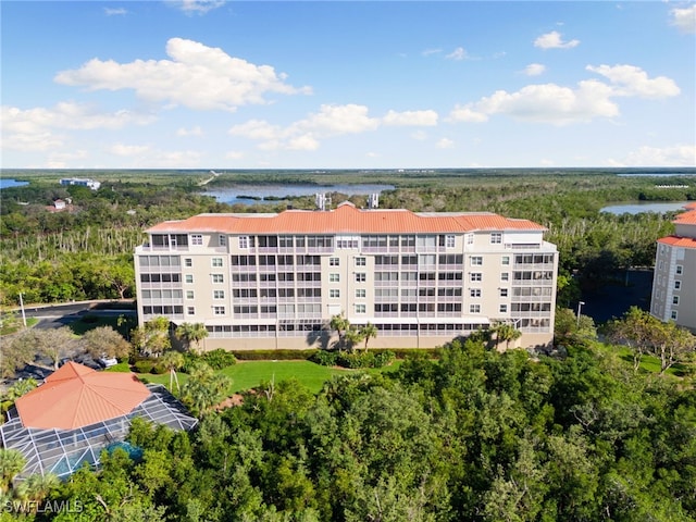 birds eye view of property featuring a water view