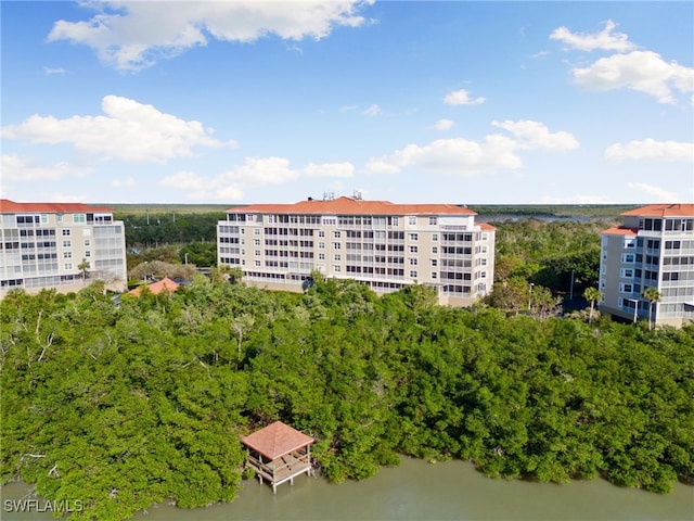 birds eye view of property featuring a water view