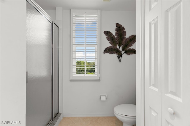 269 Vintage Bay Dr Unit C-13, Marco Island, FL 34145 - full bathroom featuring a stall shower, tile patterned flooring, and a closet