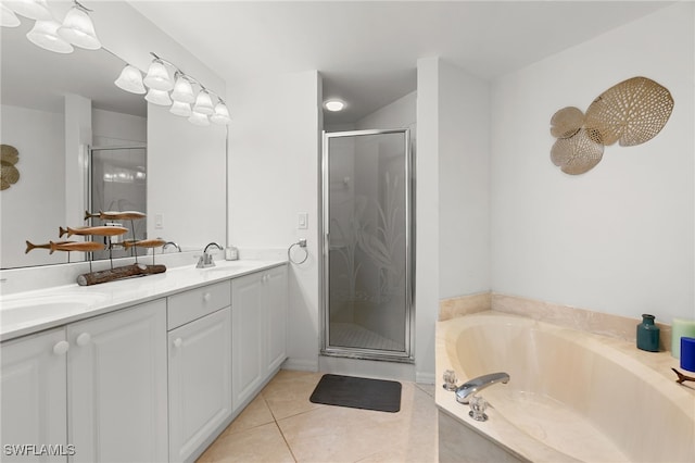 bathroom featuring vanity, separate shower and tub, and tile patterned floors