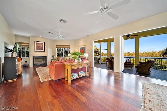 living room with dark hardwood / wood-style floors