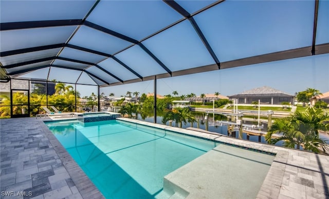 view of swimming pool with an in ground hot tub, a water view, a dock, and a lanai