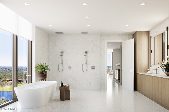 bathroom with vanity, shower with separate bathtub, and tile walls