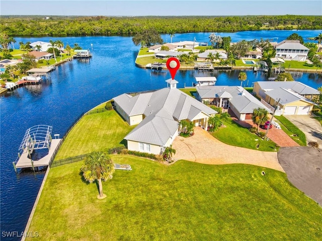 birds eye view of property featuring a water view