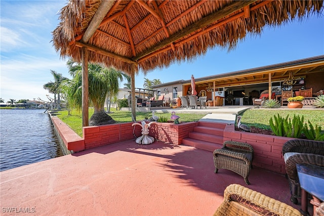 view of patio / terrace featuring a water view