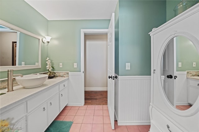 bathroom featuring tile patterned floors and vanity