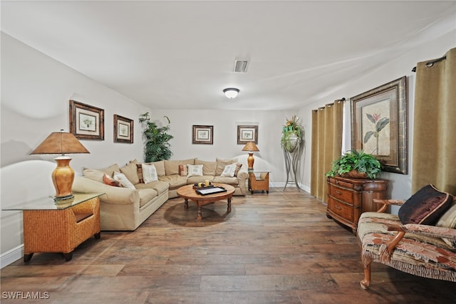 living room with dark wood-type flooring