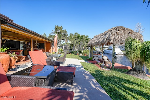 view of patio featuring a water view