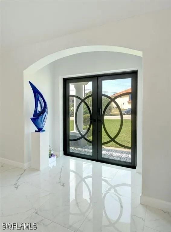 foyer featuring french doors