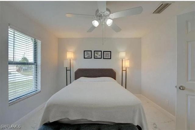 bedroom featuring ceiling fan