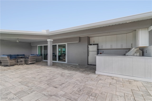 view of patio / terrace featuring an outdoor hangout area and ceiling fan