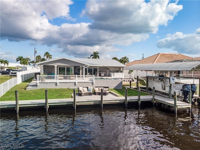 dock area with an outdoor living space, a water view, and a lawn