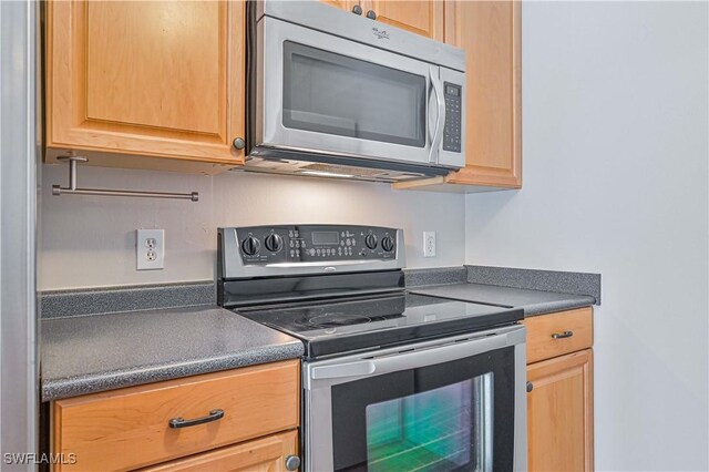 kitchen with appliances with stainless steel finishes