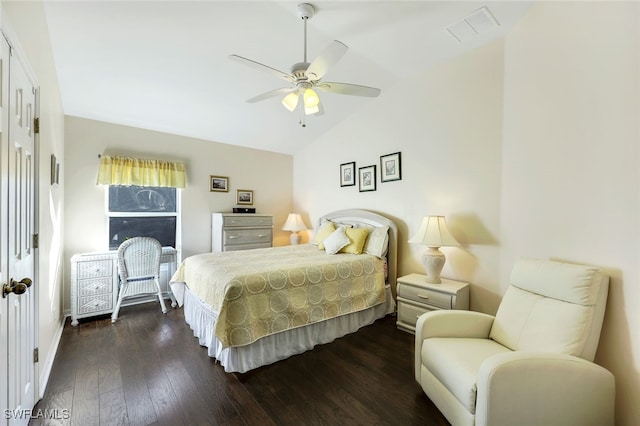 bedroom featuring dark hardwood / wood-style floors, ceiling fan, lofted ceiling, and a closet