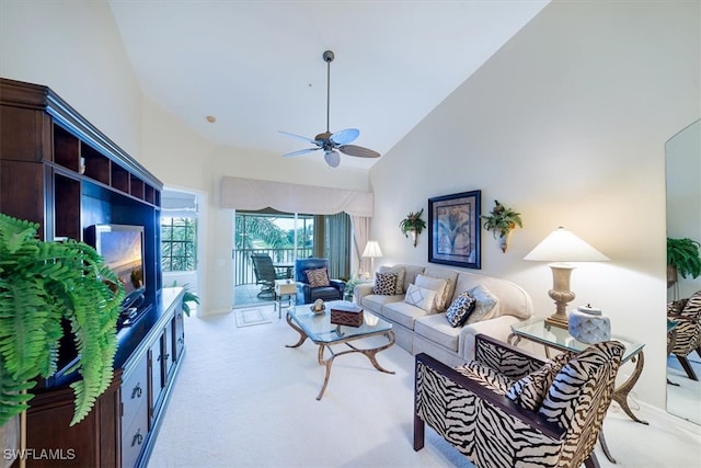 living room with light carpet, high vaulted ceiling, and ceiling fan