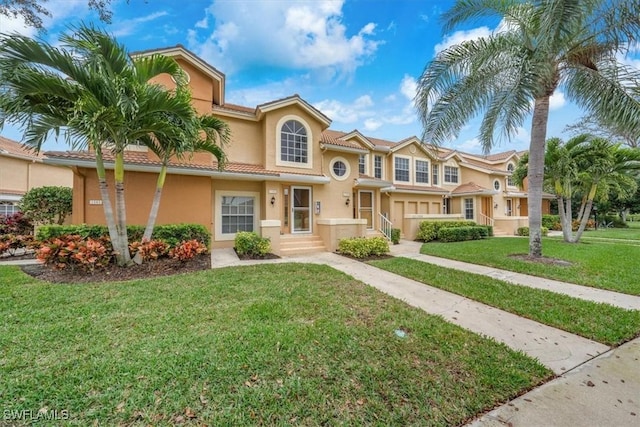 view of front of home featuring a front yard