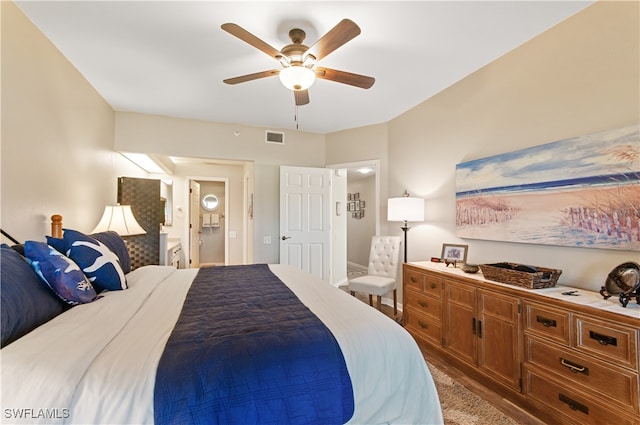 bedroom with connected bathroom and ceiling fan