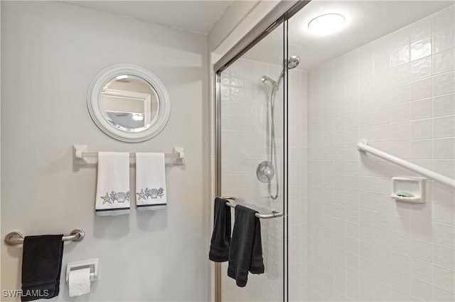 bathroom featuring an enclosed shower