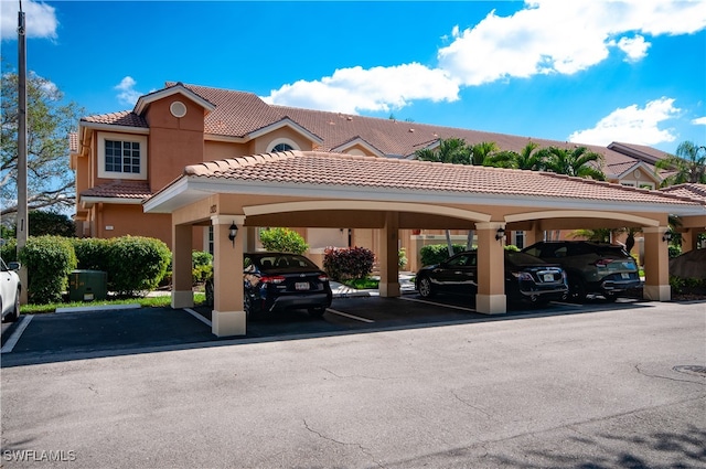 view of car parking with a carport