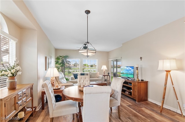 dining area featuring hardwood / wood-style floors