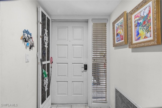 interior space featuring light tile patterned floors