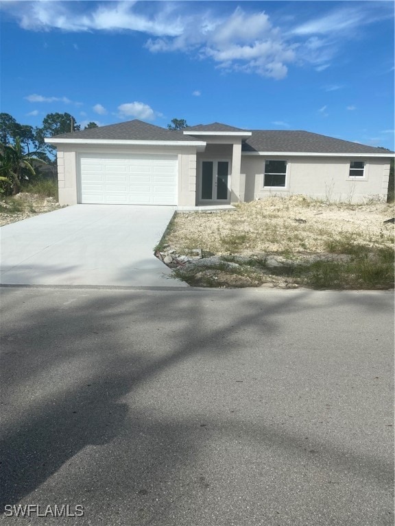 view of front of property with a garage