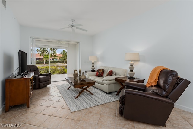 living room featuring ceiling fan, light tile patterned flooring, and visible vents