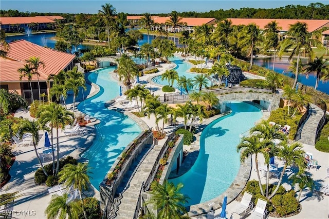 view of pool with a water view