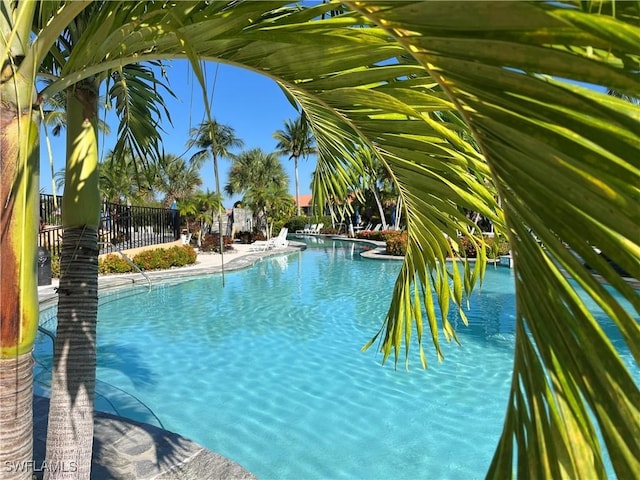 pool featuring fence