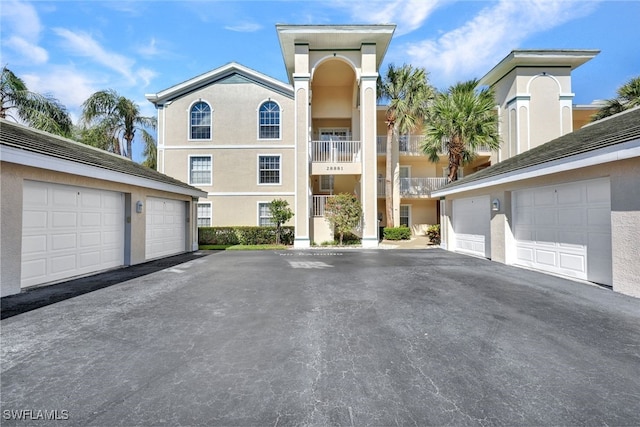 view of front of home featuring a balcony