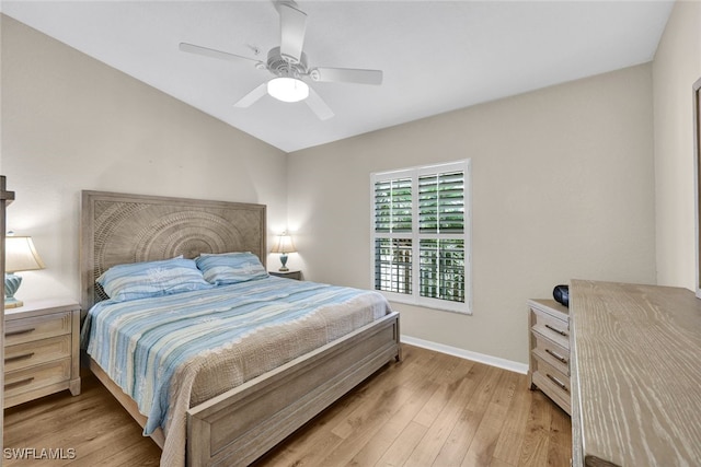 bedroom with ceiling fan and light wood-type flooring