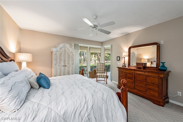 bedroom with access to exterior, light colored carpet, and ceiling fan