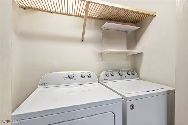 washroom featuring separate washer and dryer