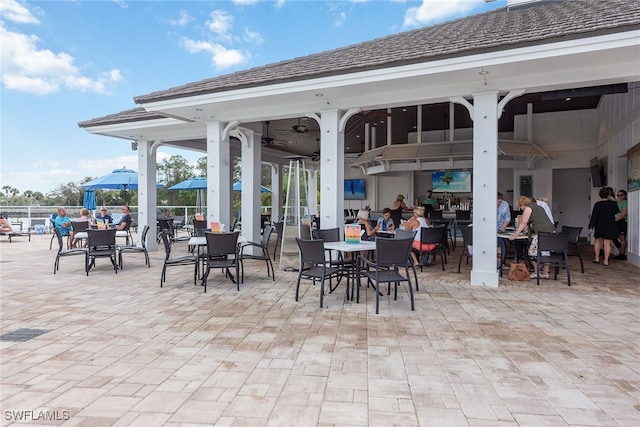 view of patio with ceiling fan