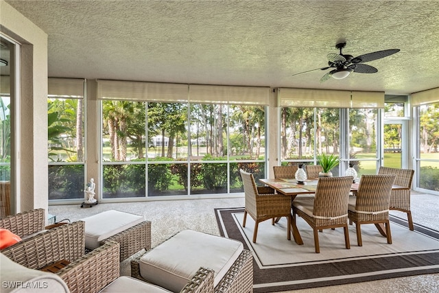 sunroom / solarium with ceiling fan