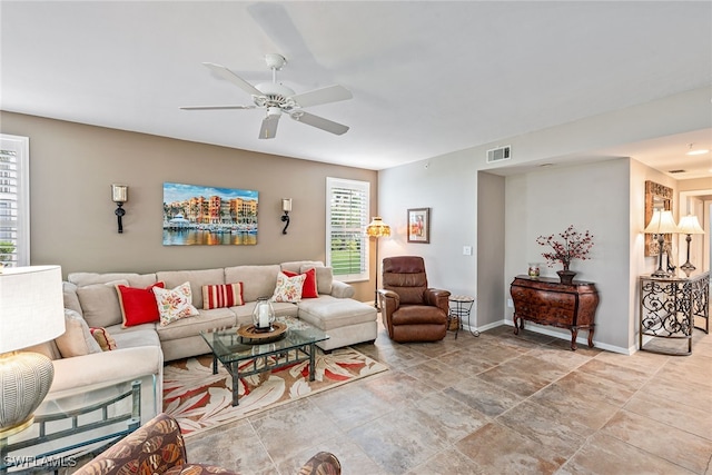 living room featuring ceiling fan