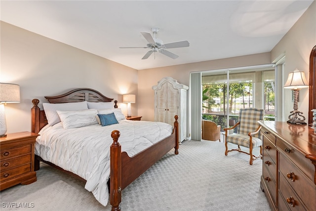 bedroom with light carpet and ceiling fan