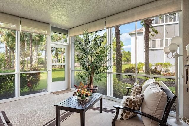 760 Waterford Dr Unit 104, Naples, FL 34113 - sunroom / solarium with carpet and a textured ceiling