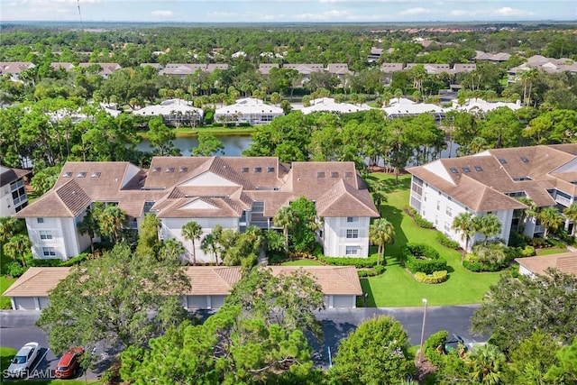 760 Waterford Dr Unit 104, Naples, FL 34113 - bird's eye view featuring a residential view and a water view