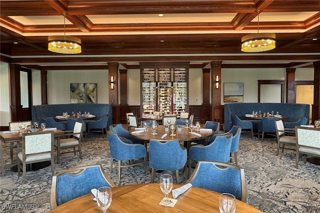 760 Waterford Dr Unit 104, Naples, FL 34113 - dining area featuring coffered ceiling, decorative columns, a chandelier, beamed ceiling, and wainscoting
