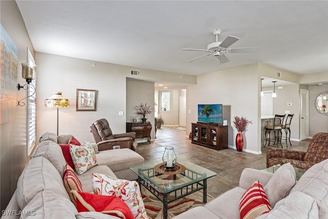 760 Waterford Dr Unit 104, Naples, FL 34113 - tiled living room featuring baseboards, visible vents, and a ceiling fan