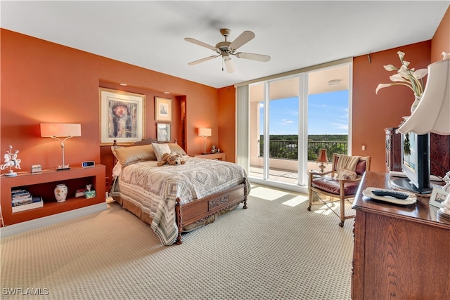 bedroom featuring access to exterior, carpet floors, and ceiling fan