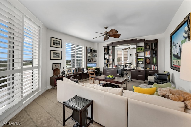 living room featuring ceiling fan