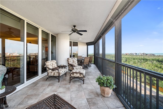 balcony featuring ceiling fan