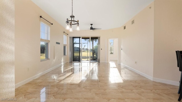 interior space with visible vents, baseboards, marble finish floor, and an inviting chandelier