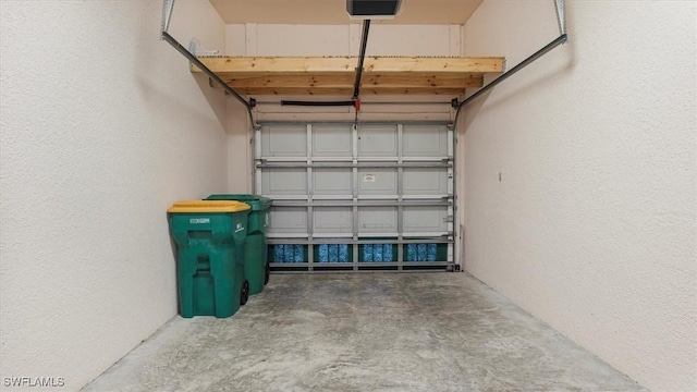 garage featuring a garage door opener