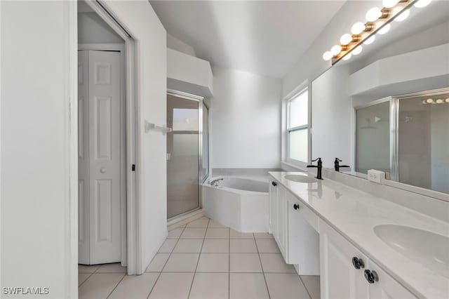 bathroom with vanity, separate shower and tub, and tile patterned floors