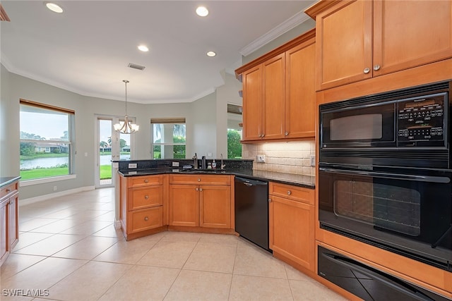 kitchen with an inviting chandelier, a wealth of natural light, crown molding, and black appliances